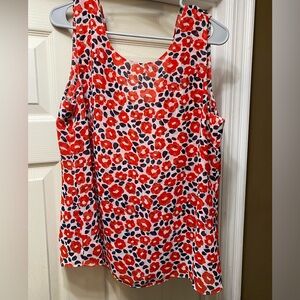 Red Cabi top with flowers and a ruffled back